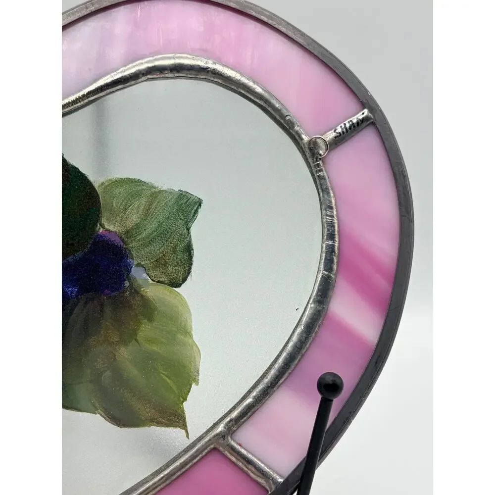 Stained glass heart. With a hand painted floral design.
